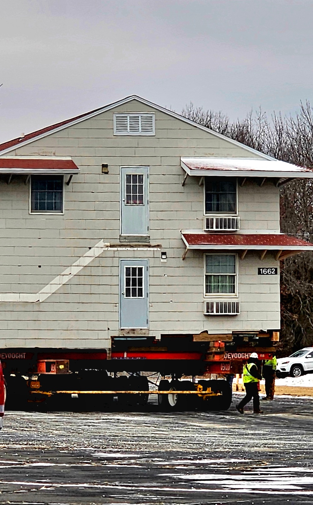 Contractors move first of five World War II-era barracks in 2025