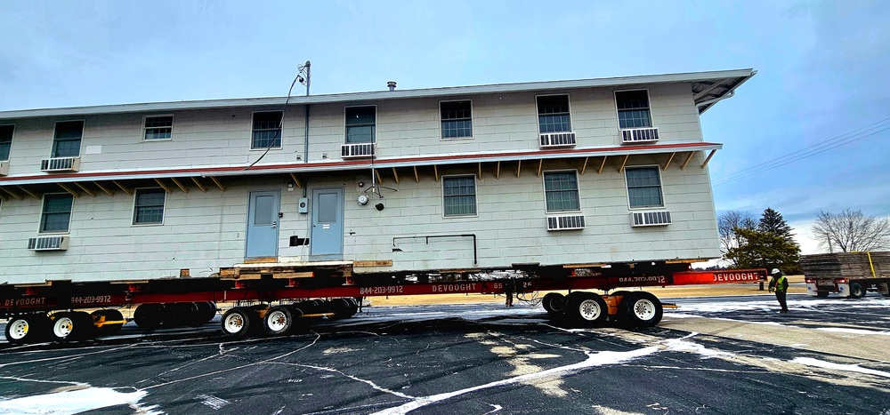 Contractors move first of five World War II-era barracks in 2025