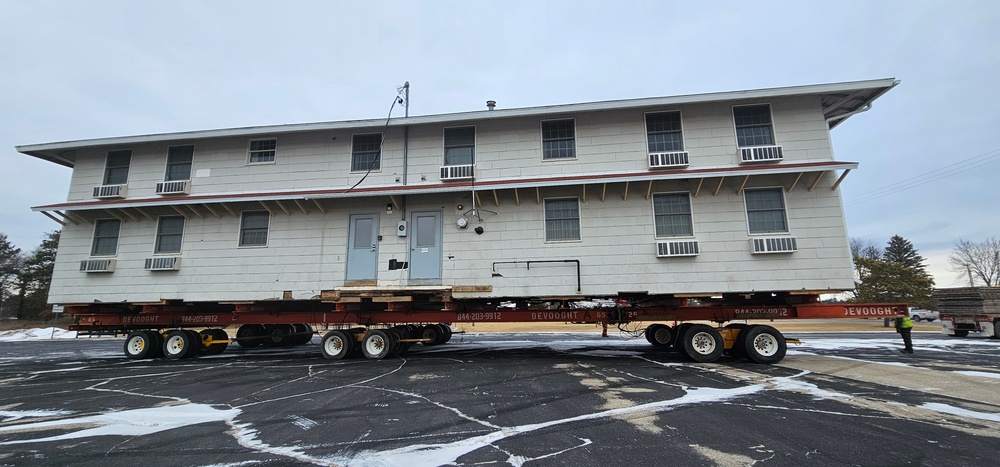 Contractors move first of five World War II-era barracks in 2025