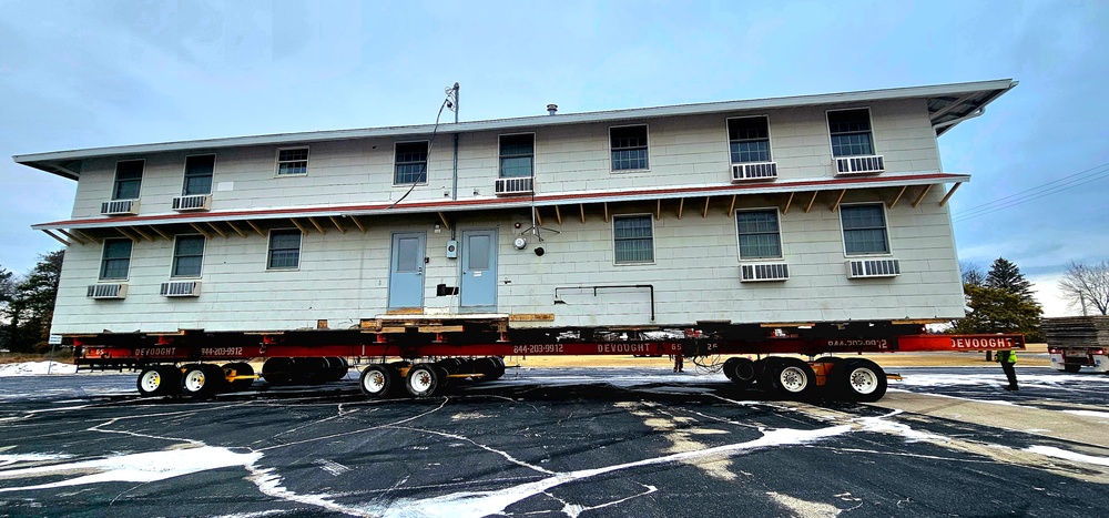 Contractors move first of five World War II-era barracks in 2025