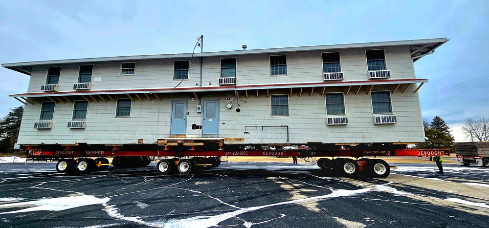 Contractors move first of five World War II-era barracks in 2025