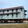 Contractors move first of five World War II-era barracks in 2025
