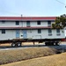 Contractors move first of five World War II-era barracks in 2025