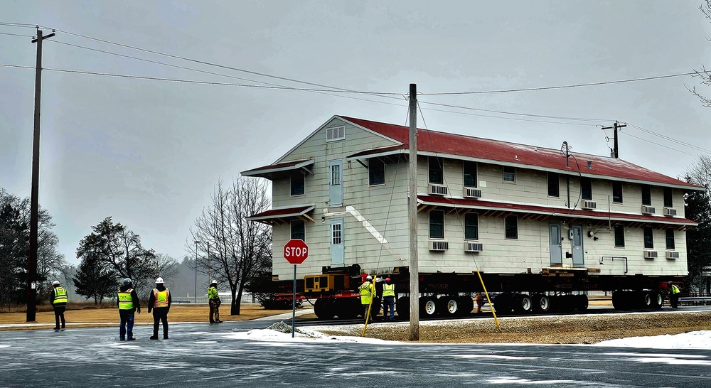 Contractors move first of five World War II-era barracks in 2025