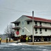 Contractors move first of five World War II-era barracks in 2025