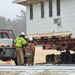 Contractors move first of five World War II-era barracks in 2025