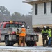 Contractors move first of five World War II-era barracks in 2025