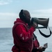 A Nimitz Sailor Acts as a Range Safety Officer