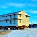 Contractors move first of five World War II-era barracks in 2025