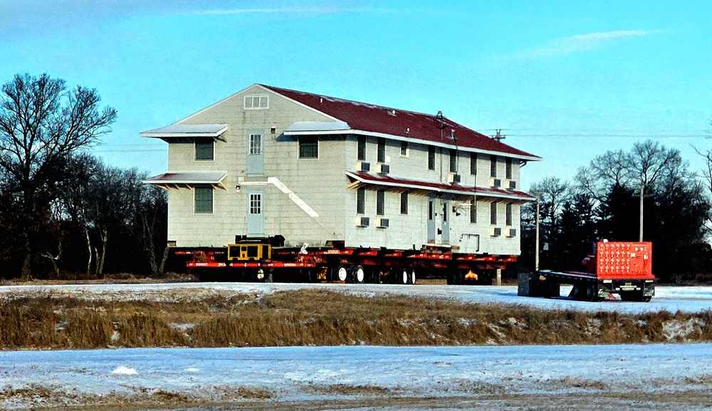 Contractors move first of five World War II-era barracks in 2025