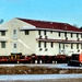 Contractors move first of five World War II-era barracks in 2025