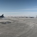 Clearing snow off the flightline