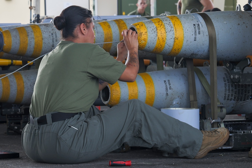 U.S. Marines and Sailors build ordnance in Guam