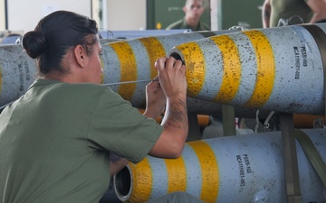 U.S. Marines and Sailors build ordnance in Guam