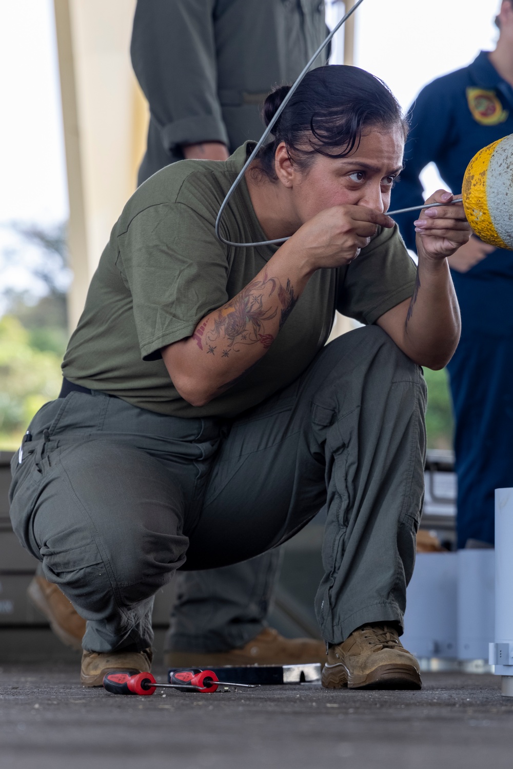 U.S. Marines and Sailors build ordnance in Guam