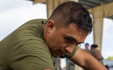 U.S. Marines and Sailors build ordnance in Guam