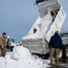 Breaking the Ice: Airmen remove snow, resume flying ops