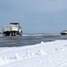 Breaking the Ice: Airmen remove snow, resume flying ops