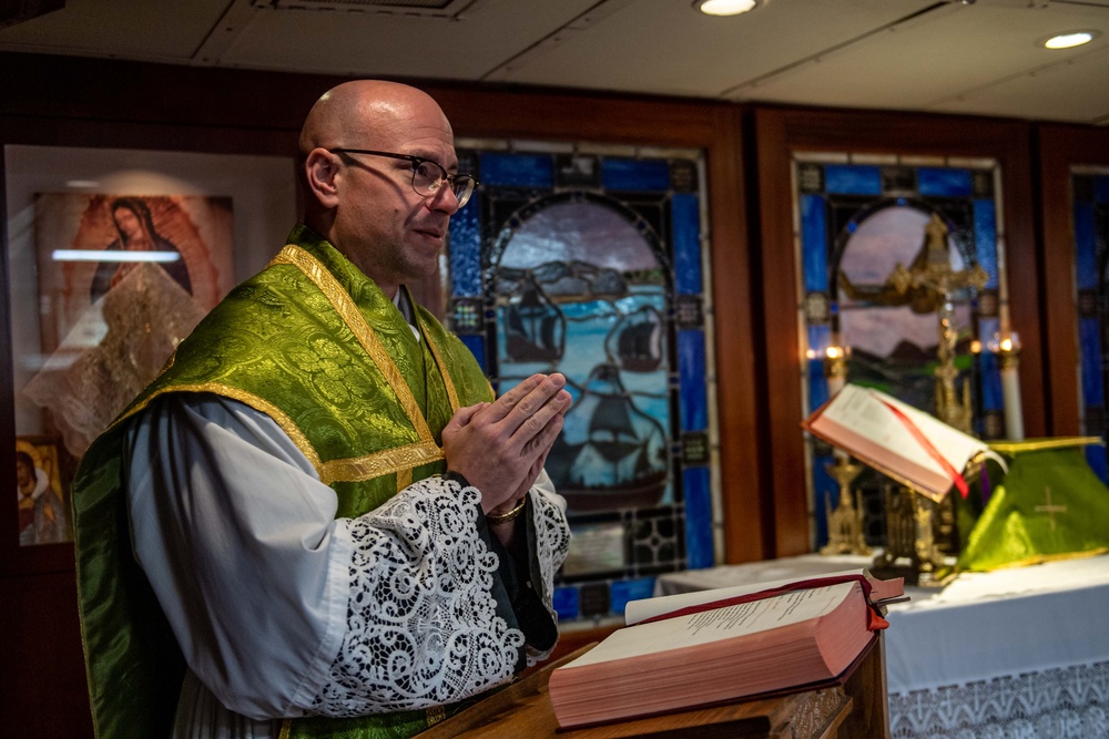 USS Ronald Reagan (CVN 76) chaplain holds daily mass