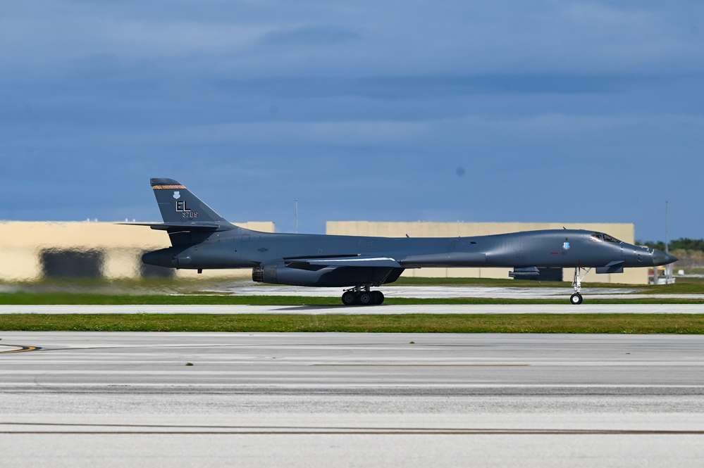 A pair of 34th Expeditionary Bomb Squadron B-1B Lancers perform dual runway takeoff at Andersen Air Force Base during BTF 25-1