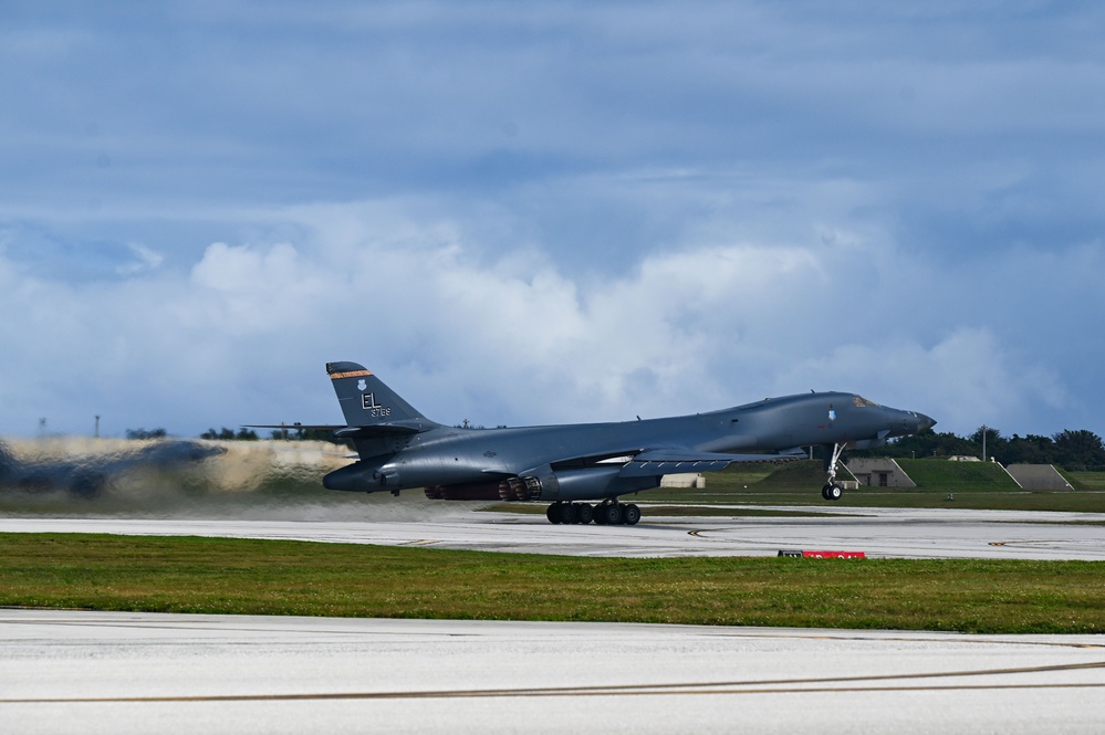 A pair of 34th Expeditionary Bomb Squadron B-1B Lancers perform dual runway takeoff at Andersen Air Force Base during BTF 25-1