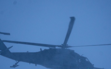 An Alaska Air National Guard HH-60G Pave Hawk helicopter departs Eielson AFB, AK on a routine training flight.