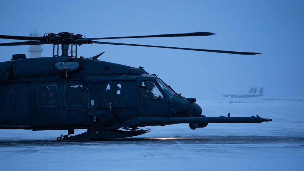 An Alaska Air National Guard HH-60G Pave Hawk helicopter departs Eielson AFB, AK on a routine training flight.