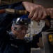 Nimitz Sailor Grinds Down Sheet Metal