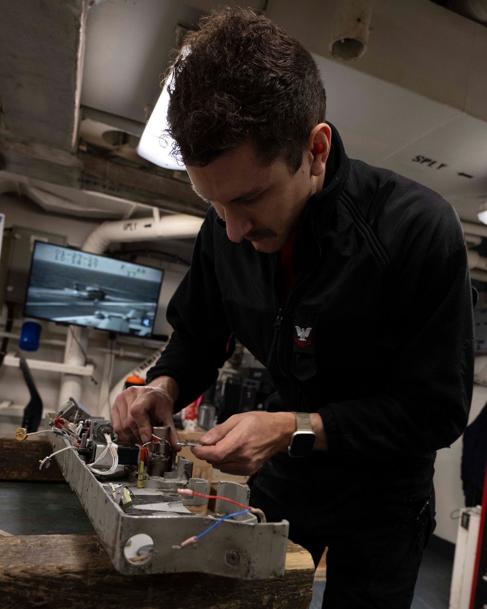 Nimitz Sailor Reassembles Bomb Rack