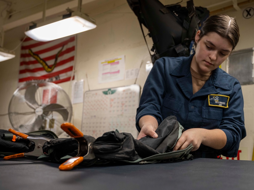 Nimitz Sailor Prepares A Survival Equipment Unit