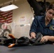 Nimitz Sailor Prepares A Survival Equipment Unit