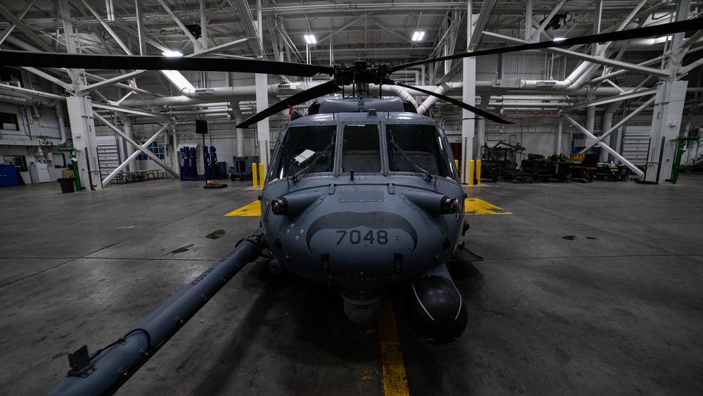 An Alaska Air National Guard HH-60G Pave Hawk helicopter departs Eielson AFB, AK on a routine training flight.