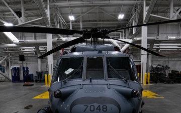 An Alaska Air National Guard HH-60G Pave Hawk helicopter departs Eielson AFB, AK on a routine training flight.