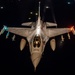 F-16 Fighting Falcons join KC-135 Stratotanker for aerial refueling over USCENTCOM at night