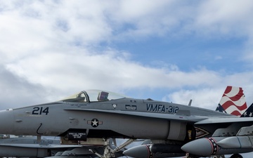 Marine F/A-18 loads Air Force missile in Guam