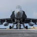 Marine F/A-18 loads Air Force missile in Guam