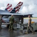 Marine F/A-18 loads Air Force missile in Guam