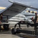 Marine F/A-18 loads Air Force missile in Guam