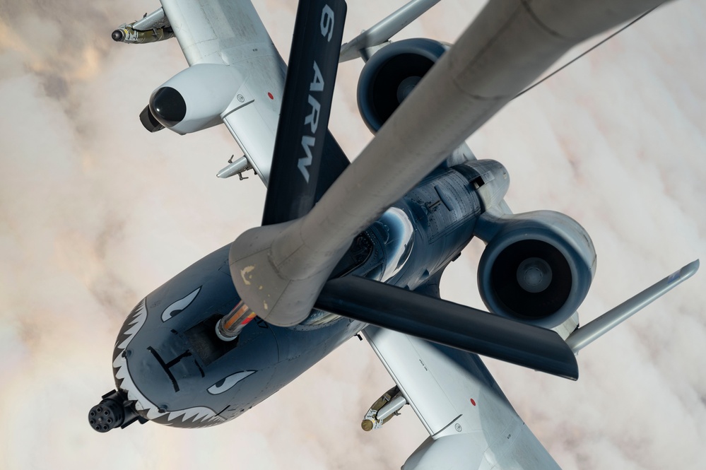 Fighters fly over cloudy skies