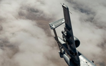 Fighters fly over cloudy skies