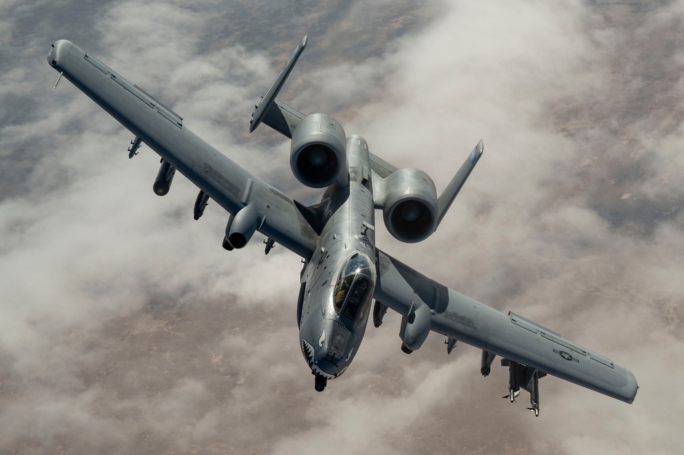 Fighters fly over cloudy skies