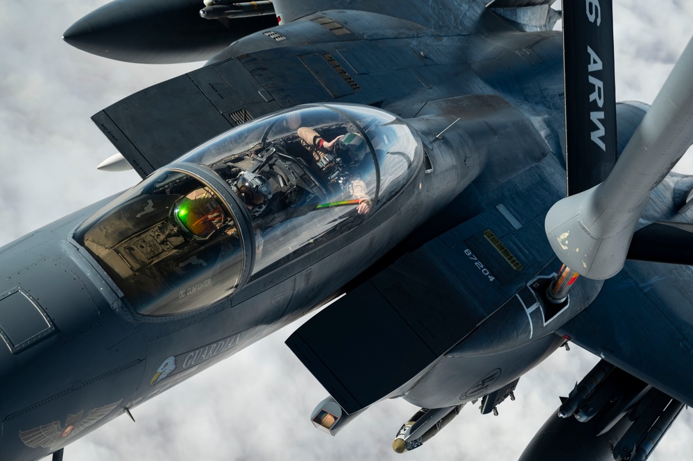 Fighters fly over cloudy skies