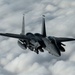 Fighters fly over cloudy skies