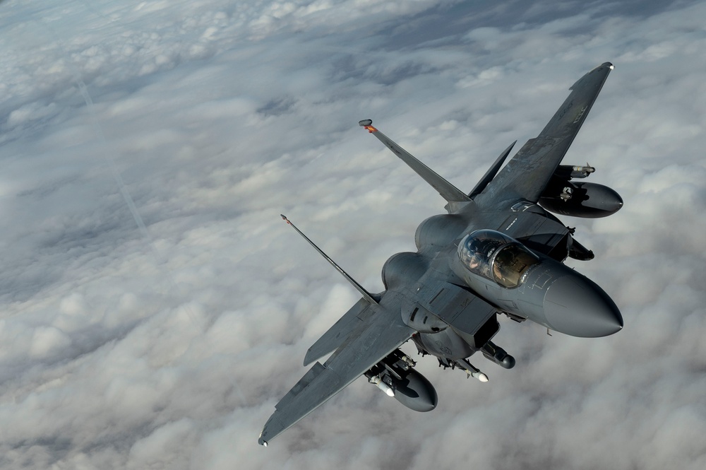 Fighters fly over cloudy skies