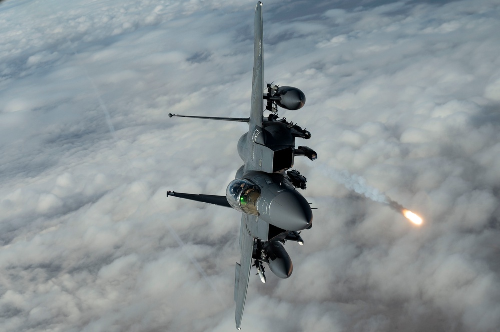 Fighters fly over cloudy skies