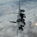 Fighters fly over cloudy skies