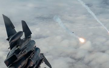 Fighters fly over cloudy skies