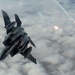 Fighters fly over cloudy skies