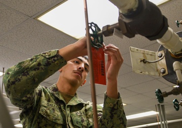SWESC GL BECC Students Hang Danger Tags