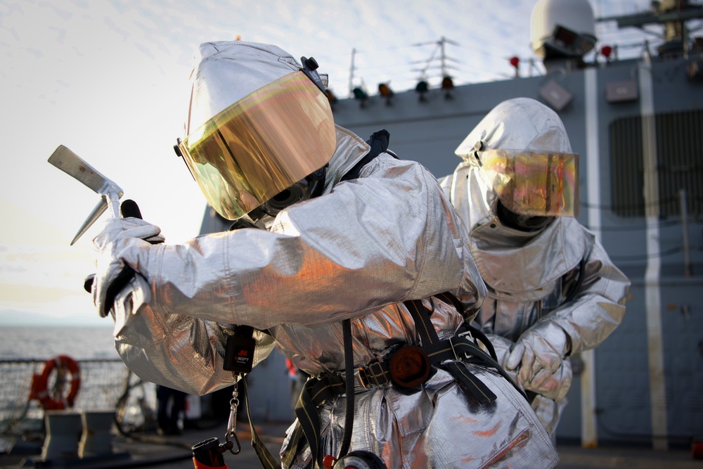 Sailor Participate In a Firefighting Drill